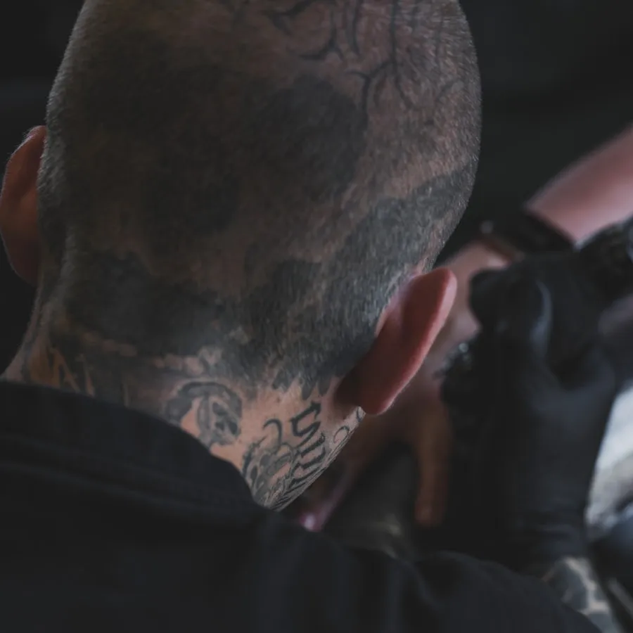 Mikey Brant shaping a beard at Ironwood Barber Co.